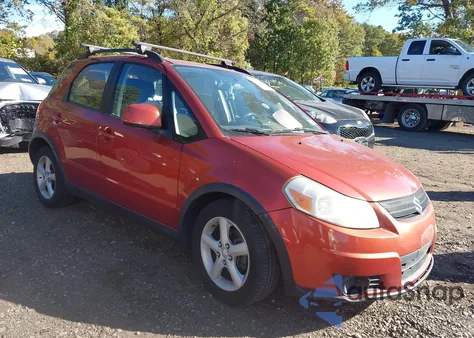 2009 Suzuki Sx4 Technology z USA, uszkodzony, nr VIN JS2YB413X96200669